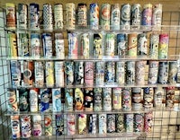 a display of many different types of spray cans