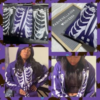 a woman wearing a purple skeleton hoodie